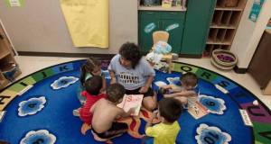  A teacher reads to young children at the Francis Institute for Child and Youth Development at Metropolitan Community College-Penn Valley. Shane Keyser  / The Kansas City Star